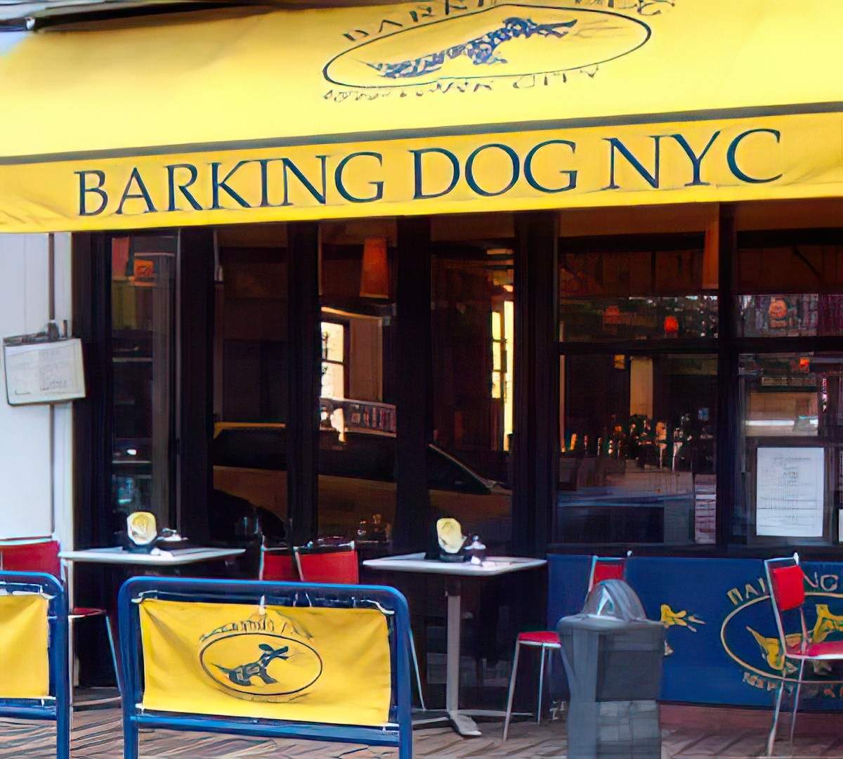 A restaurant with a yellow awning